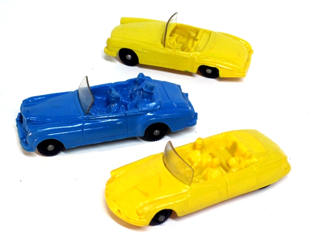 At top in this photo is a yellow Tomte Laerdahl Mercedes 190SL, below that a blue Bentley convertible with driver and passengers. At bottom is a yellow Citroen DS Cabriolet with driver and front and rear seat passengers, all cars fitted with black wheels, each 4 inches long.