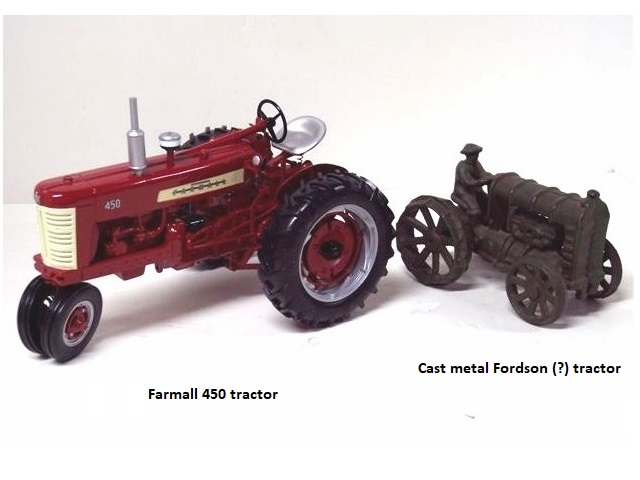 My nostalgia for old Farmall tractors began sometime before we bought our 450D Farmall, so here we see one of that family and a cast metal tractor, likely a reproduction, of a Fordson. Why are they here? Just 'cuz.