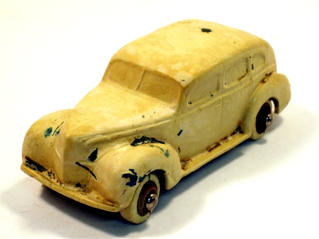 An unpainted (formerly green) 1939 Ford sedan from the International Golden Gate Exposition.