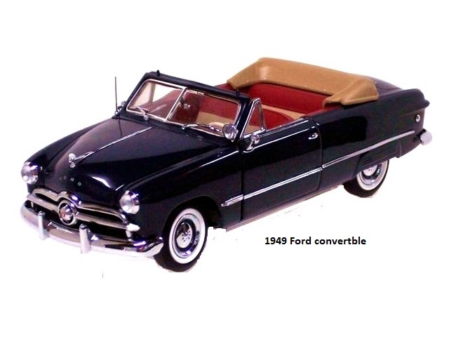 This is a photo of a lovely, dark blue 1947 Ford convertible. There is a bright chrome strip running down each side, giving the car a longer, lower look. It has two-tone red and dark tan upholstery, a folded, tan top, and  white sidewall tires.