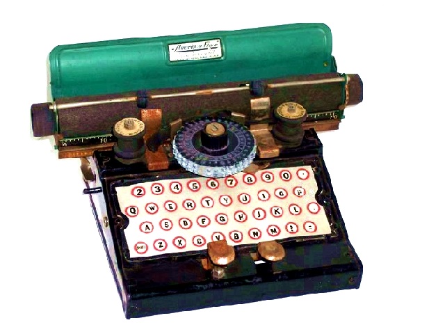 Though relatively common, the American Flyer toy typewriter often is found with the operating mechanism broken. This part is made from pot metal and is
			very easily broken into several pieces. Even though it may look brand new, it is inoperable so look to be sure you know if it is working or not. This one works great! Made between 1934 and 1937, it has a stamped steel body painted black, a paper letterpad with keys printed on it, a platen with black hexagonal plastic platen twirlers, and a green paper table. Just like real typewriters, it uses a ribbon that is wound on two wooden ribbon spools that have to be advanced manually. There is a paper bail with two rubber paper rollers, and a line gauge attached to the body of the typewriter. Thick metal paper pressure pieces keep the paper tight to the platen when advanced. There are ribbon guides attached to the index, which is black plastic and has upper and lower case letters as well as numbers and figures molded in. In its day, it was a big seller.