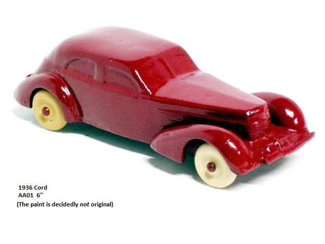 Left front quarter view of the Auburn rubber Cord. The supercharged Cord is six inches long and glossy red. I doubt that the paint is original but it is excellent.