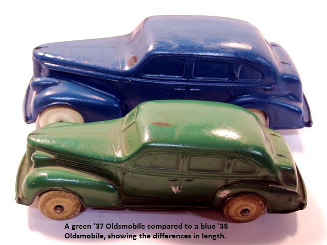 The blue '38 Oldsmobile side by side with a green '37 Olds.