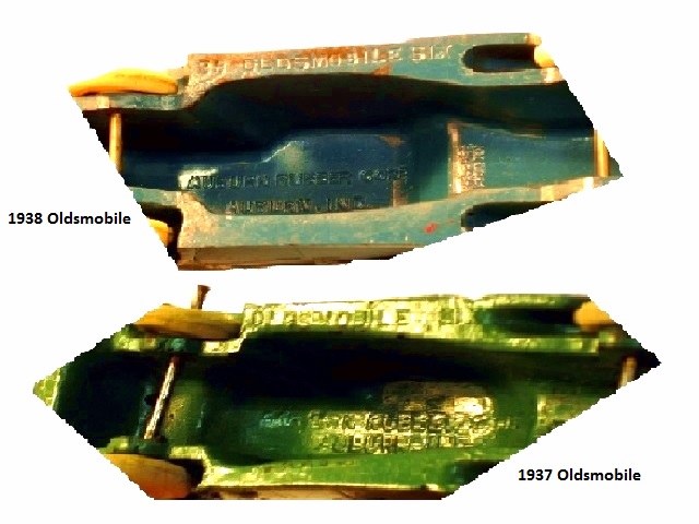 A '37 and '38 Olds compared from below.