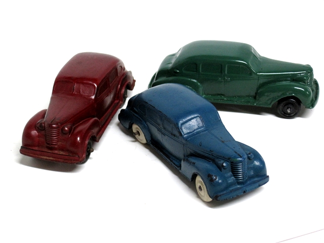 Another grouping of '37s, this one with a red car, a blue car, and a green car border=
