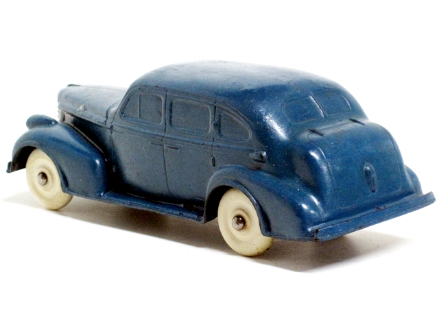 Here one sees the blue '38 Oldsmobile from the left rear quarter.