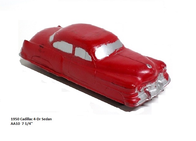 A front corner view of a red 1950 Cadillac four-door sedan. The toy is 7 1/4 inches long