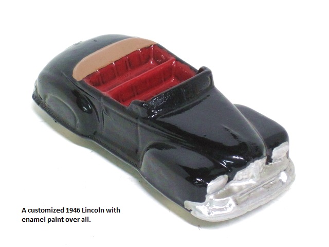 A custom painted green 1946 Lincoln with green interior and square headlights. Four and one half inches long.