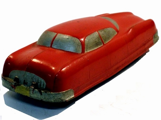 This is a red version of the '49 futuristic sedan, decked out with silver. It has the larger bumpers.