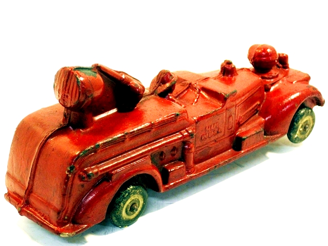 A view along the passenger's side back to front of the most rare Auburn fire truck.