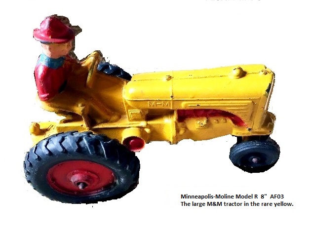 An 8 inch tractor, this Minneapolis-Moline is bright yellow, a rare tractor color.