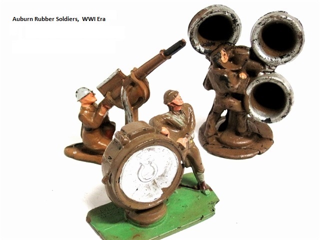 This is an antiaircraft grouping including a soldier manning a searchlight, another operating an antiaircraft gun, and a third operating a sound detector (three large directional detection cones).