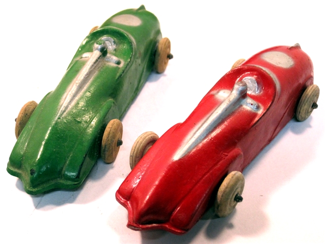 The same pair of open racers seen from the rear quarter. From this angle the broad, flatten body is very pronounced.