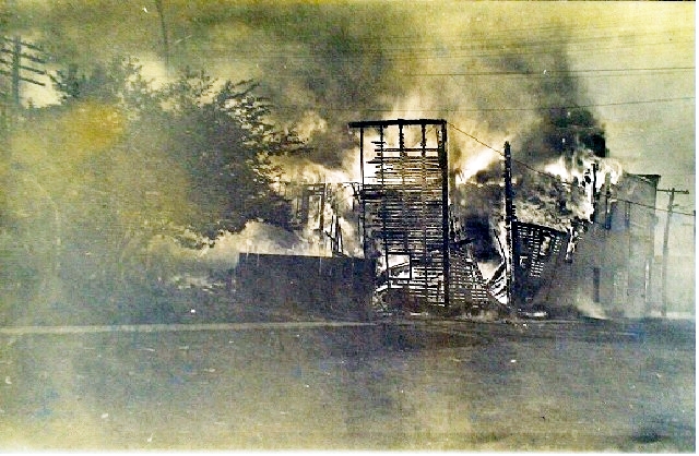 In this photo the Auburn factory is fully engulfed in flames. Saved by insurance!