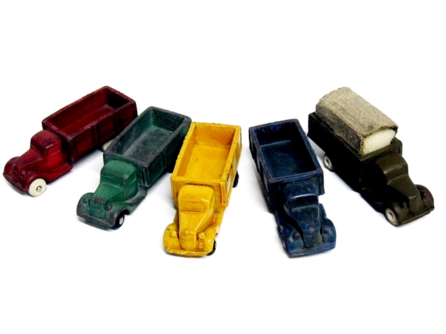 This is a fan of trucks, each of the colors presently in the museum collection: one each in red, green, yellow, blue, and army green with canvas cover for the bed.