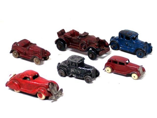 There are six cast metal cars from Barclay and various unknown makers in this group