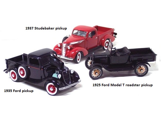 In this photo we get a three-fer, three pickup trucks. One is the Studebaker described above. Another in front and to the left of it is a 1935 Ford pickup, very dressed up with dark blue paint, red pinstripes, and wide whitewalls. The hood is up so the green Ford flathead V8 peeks out. The third truck is a 1925 Model T Ford roadster pickup with the top down. It is the usual black, with a wood-plank bed floor and demountable wooden wheels.