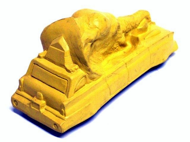 This elephant car is solid yellow with no silver trim. Like all the Garrett vehicles, it has black tires.