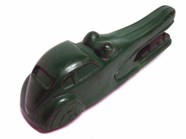 It's kind of funny but to me this looks like a Bugatti coupe, mostly due to the very long snout and the close coupled, bulbous coupe body. Cute as can be, really. Mine is solid green but others are trimmed out in yellow, red and silver.