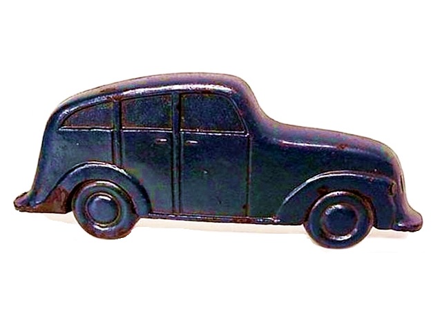 This photo is of the flat, thick blue sedan, about 4 inches long and half an inch thick. It is has four doors and is a fastback style. None of the vehicles in the set roll as the wheels are molded as part of the body.