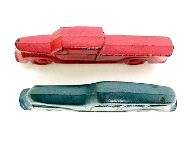 This photo is of the two vehicles side by side and viewed from above. They are about three quarters to an inch thick and stand up on their own very well.