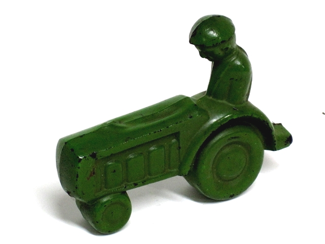 This is a photo of the Judy rubber tractor. Like the rubber cars this tractor is flat, and about three quarters of an inch thick as well. 