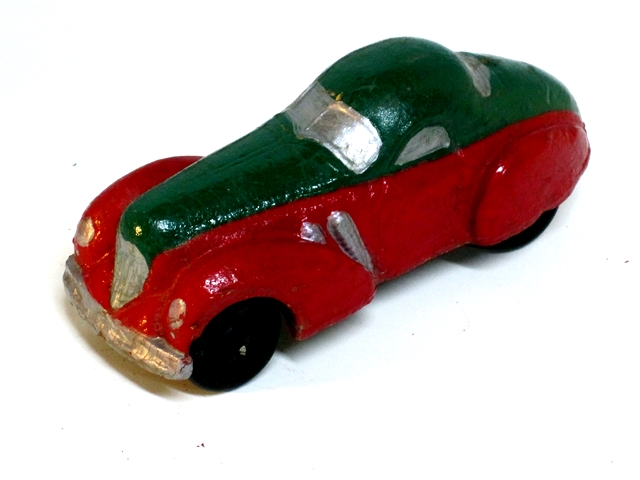 The Supercharged Coupe in green over red viewed from the driver's side front quarter. Though well done, this looks to be a repaint.