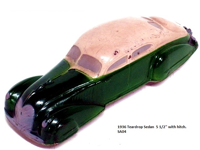 A Teardrop Sedan in white over green.