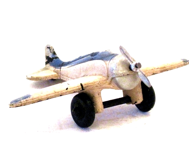 Single seater with white paint and blue striping, taken from the left front quarter.