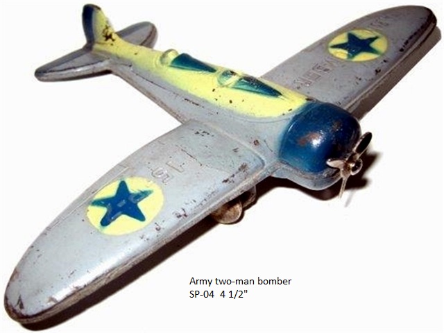 A single engine, two man bomber airplane with pilot cockpit in front of bombardier cockpit, silver with blue cowl, blue flaps on the tail, yellow circles with a 5 point star atop each wing, cream yellow around cockpits and along top of body, two black tires and a metal prop. Underside shows bomb detail.
