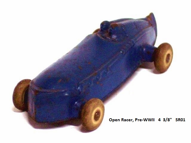 A left front quarter view of a pre-WWII version of the open racer, painted solid blue, with small white tires. No number.Four and a quarter inches long.