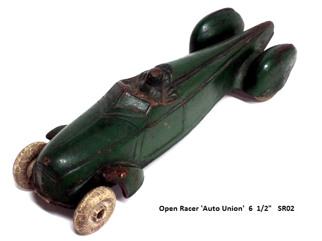 A green open race car loosely modelled on the German Auto Union cars. It is six and a half inches long. These race cars usually are found in a well worn state.