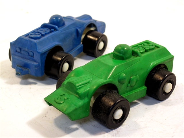 These two are what I call armored race cars with a cop light on the top. One is blue, one is green and when I find out what they really are I'll edit this. Like all Wee Wheels it is all angles and planes from the forward tilted jet intake grill surround to the slanted windshield, to the molded, high-arched wheel well edges, to the vertical rear body panel. There are lumps and bumps that represent Heaven knows what.