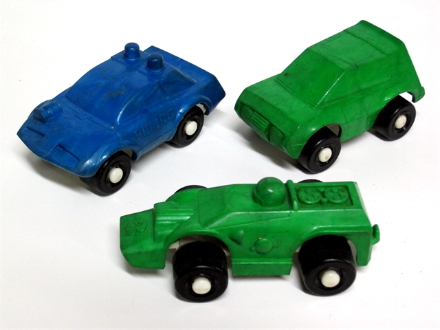 Three Wee Wheels vehicles, a tank, a Gremlin auto, and a police car.
