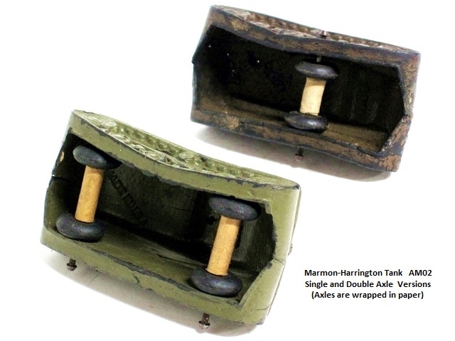This is a picture of the two versions of the AM02 tank from the underside. Shown are the single and the double axle versions. The axles are wrapped in paper in both versions.