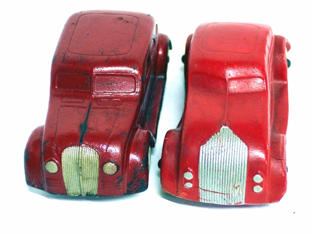 This is a front view of the two Airflows. The DeSoto has two headlights, one on each side of the grill. The grill is rounded at the top. The hood is wider on the DeSoto, as is the fabric top. The split windshield, with two air vents, one on each side in front of the windshields. The windshields are taller on the DeSoto, and the fabric insert on the top. It is also longer. The Chrysler has a grill that comes upward on the Chrysler, which has two smaller headlamps on each side. On the Chrysler, the hood is not apparent.