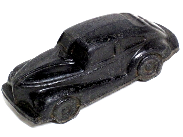 A shiny black '41 Nash shown from above the left front quarter.
